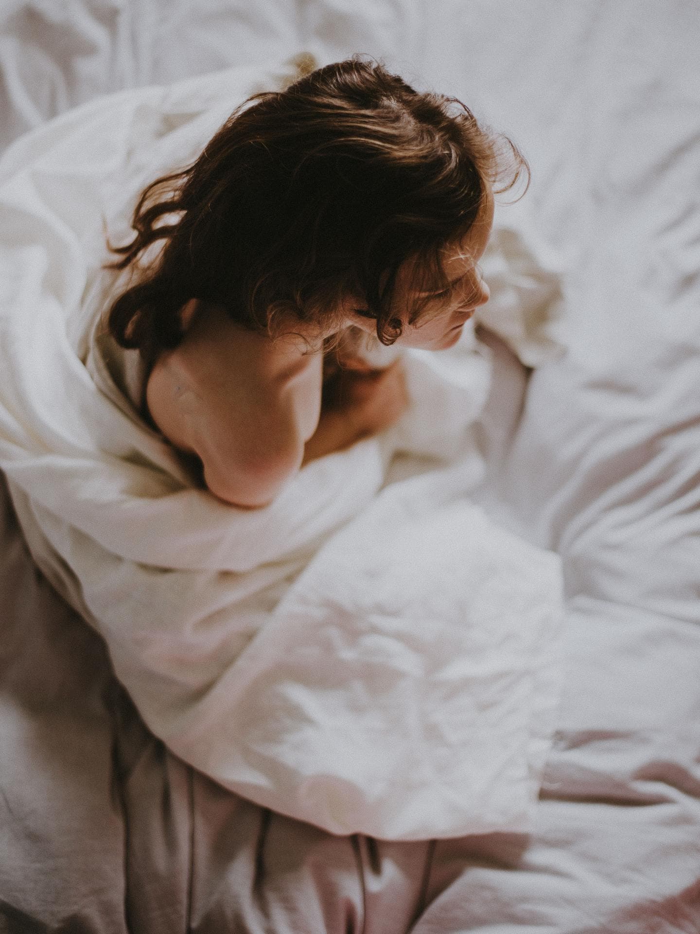 Mädchen im Bett