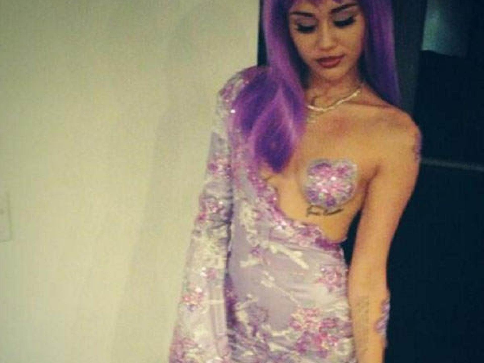 Miley Cyrus als Lil' Kim